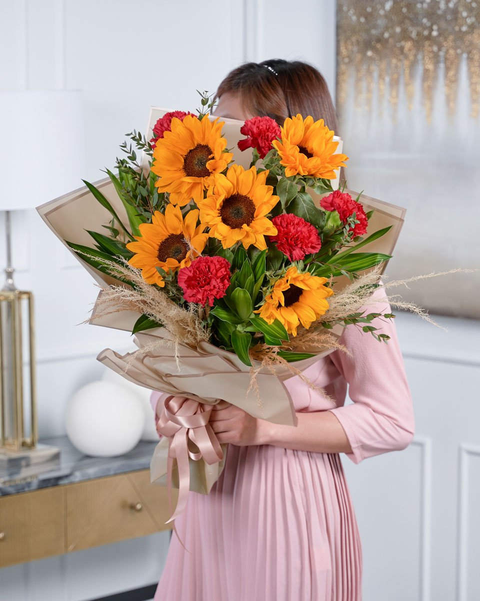 Color Divine lady holding a bouquet of carnation and sunflowers
